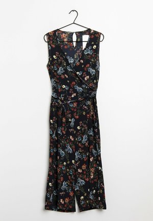 Blumiger Jumpsuit in Dunkelblau mit roten und blauen Blumenmustern. Besitzt ein Wickeldesign, ärmellosen Schnitt und einen Bindegürtel in der Taille.