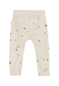 Cremefarbene Baumwollhose mit bunten Pünktchen in Gelb, Braun und Grau. Mit umgeschlagenen Knöcheln und elastischem Bund.