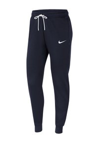 Donkerblauwe sweatpants van zacht materiaal, met een trekkoord in de taille, elastische boorden en een witte Nike-logo op de linker dij.