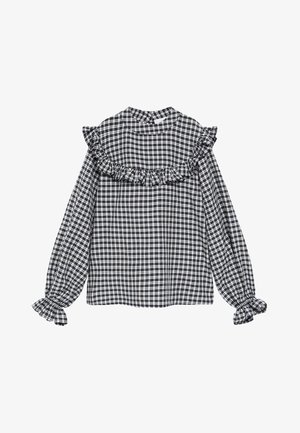 Czarna i biała długa bluzka w kratę z falbanką na wysokości klatki piersiowej, ramionach oraz elastycznymi marszczonymi mankietami.