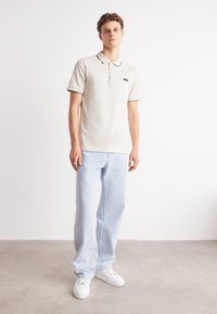 Calvin Klein MULTI TIPPING  - Polo shirt - stony beige/vanilla ice
