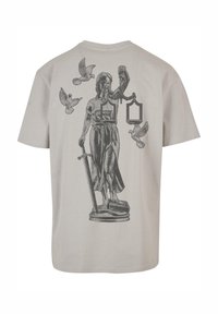 Gray cotton t-shirt featuring a black graphic of a statue holding scales and a sword, with birds flying around it on the back.