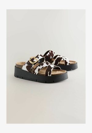 Next, Pantolette hoch - new cow print