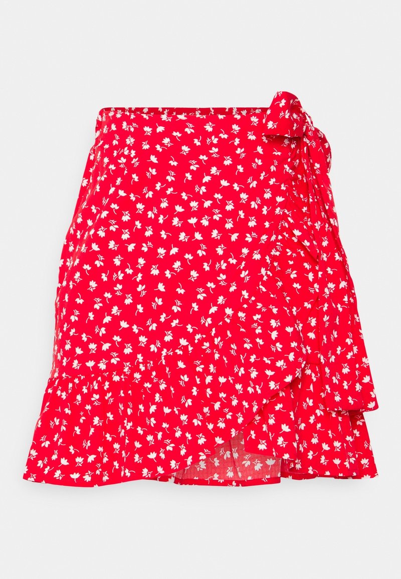 Jupe portefeuille rouge à fleurs avec petits motifs floraux blancs, ourlet à volants et détail de nœud noué sur le côté droit.