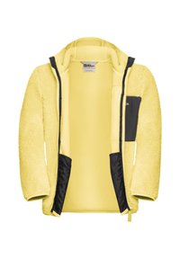 Keltainen fleece-takki, jossa on teksturoitu pinta, mustat kangaskoristeet, vetoketjusulku ja kaksi sivutaskua. Sisäpuolella on pehmeä keltainen vuori.
