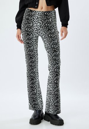 FLARE  - Stoffhose - black