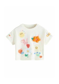Biały bawełniany t-shirt z kolorowymi aplikacjami przedstawiającymi kwiaty, słońce i króliczka. Krótkie rękawy, okrągły dekolt i zabawne akcenty.