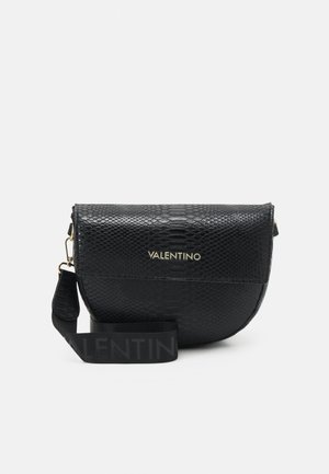 Black handbag with a textured snake-skin pattern, gold branding, and a wide black strap featuring the brand name in gray. Compact and curved shape.
