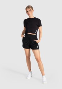Smilodox CROP - T-shirts print - schwarz