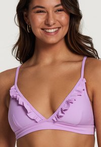 Lilac bikini top featuring a triangle shape, thin adjustable straps, and ruffled accents along the neckline. Smooth, stretchy fabric.