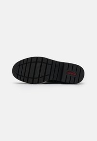 Rieker Botas con plataforma - black