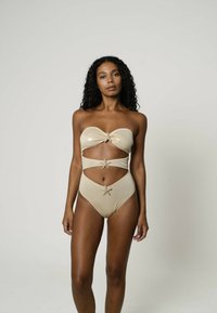 Moda Minx Badedragt - gold