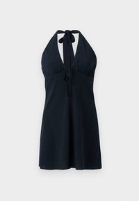 Dark navy halter dress with a deep neckline, gathered waist, and ties at the neck and waist. Smooth fabric with a flowing silhouette.