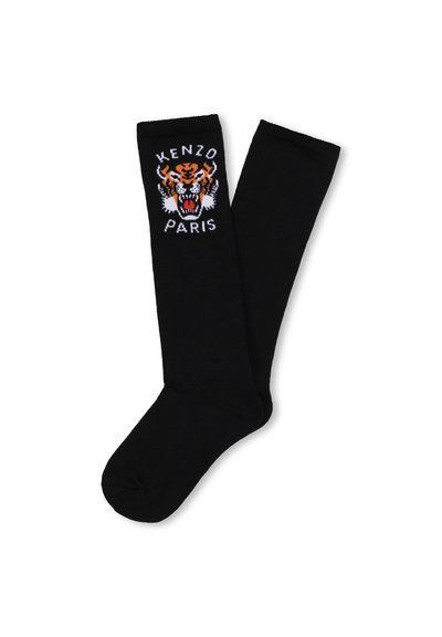Calze lunghe nere con un design ricamato a testa di tigre in arancione, bianco e nero, con la scritta "KENZO" e "PARIS" sopra.