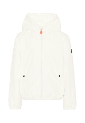 Giacca bianca con cappuccio, cerniera frontale, polsini ed orlo elasticizzati, tasche laterali con zip e una piccola toppa sulla manica sinistra.