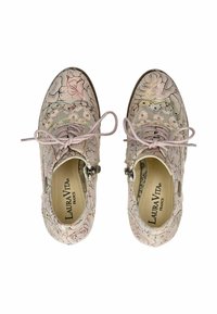 Scarpe con motivo floreale, dalla tomaia in tessuto rosa chiaro, con cuciture decorative, punta tonda e design con lacci. Presentano un interno con marchio.