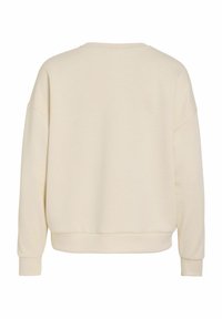 Lys beige genser med rund hals, droppskuldre, lange ermer og ribbet kant. Glatt stoff med ensartet tekstur.