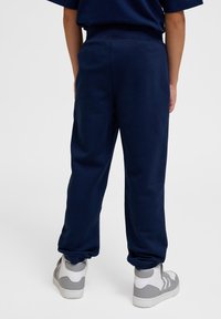 Hummel CLEAN ADJUSTABLE - Trainingsbroek - black iris