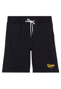 Pantalones cortos negros de material suave con cinturilla elástica, cordón blanco, bolsillos laterales y un logo amarillo "Creeks" en la parte frontal.