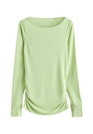 Svetlozelený top s dlhým rukávom z hladkej látky. Má široký výstrih a nariasené bočné detaily pre priliehavý vzhľad.