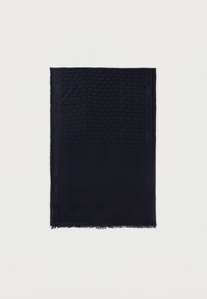 Mørk marineblå rektangulært tørklæde med diskrete "MK" og "Michael Kors" mønstre vævet ind over det hele og frynser ved kanterne.