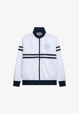 White sports jacket with navy accents, horizontal stripes, and a zip front. Features a logo and side pockets. Made of smooth fabric.