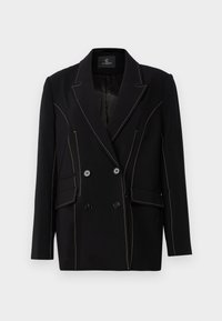 Blazer nero doppiopetto realizzato in tessuto intrecciato, con cuciture beige a contrasto, due tasche anteriori e bottoni neri.
