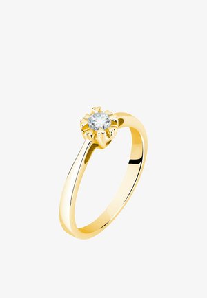 Goldener Ring mit einem einzelnen runden Diamanten, der in einer floralen sechszackigen Fassung auf einem polierten, glatten Band gefasst ist.