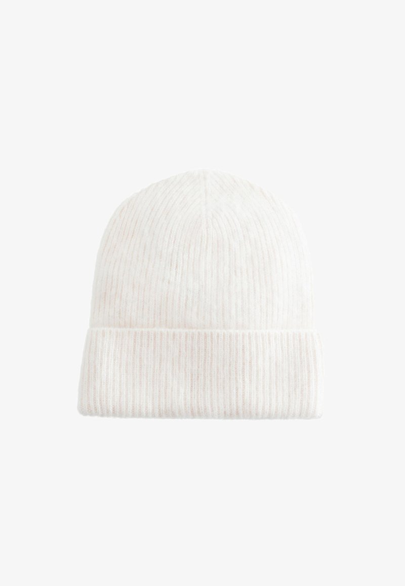 Ribbed knit beanie in soft white with subtle pink flecks, featuring a rolled cuff and a textured finish for warmth and style.