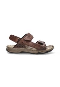 Sandalia de cuero marrón con correas de velcro ajustables, diseño de punta abierta, acentos perforados y una suela de goma texturizada en color beige.
