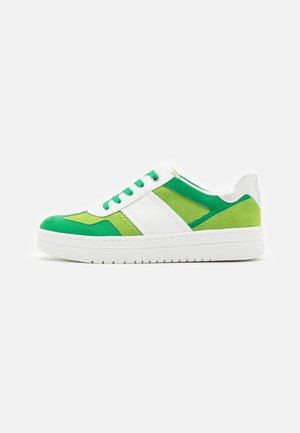 Green and white sneaker with a smooth leather and soft fabric upper, featuring a white midsole and textured rubber sole for grip.