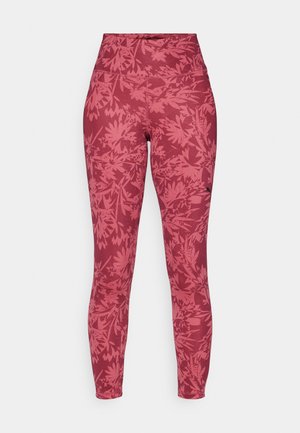 Piros leggings, amelyek illeszkedő kialakításúak, magas derékúak és egy sötétebb árnyalatú piros levelek mintázatával díszítettek. Rugalmasságot biztosító, texturált anyagból készült.