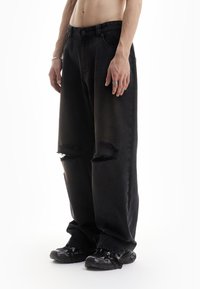 FAVELA HEAVY BAGGY DISTRESSED DIRT WASH UNISEX - Platūs džinsai - black washed