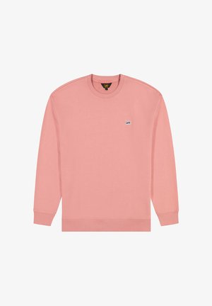 Felpa rosa chiaro in tessuto morbido, con scollo rotondo, maniche lunghe e un piccolo logo ricamato sul petto.