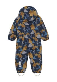 Mörkblå vadderad overall med flerfärgade geometriska mönster i gult, blått och grått. Har en huva och elastiska ärmslut; avtagbara fotremmar.