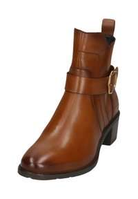 Brown leather ankle boot with a block heel, featuring a side strap and gold buckle, smooth texture, and quilted detail on the side.