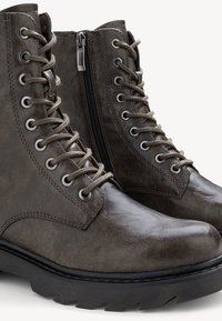 Dark grey lace-up ankle boots with a glossy leather finish, padded collar, and side zipper. Features a textured outsole for grip.