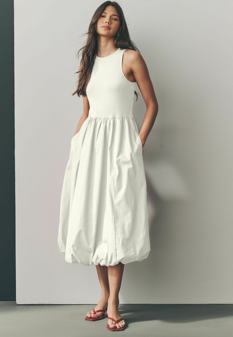 knee length dresses for ladies Ginnee Puff Sleeve Cutout Midi Dress