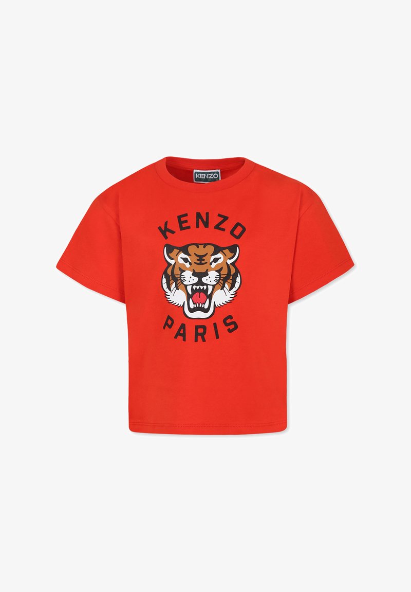 T-shirt en coton rouge avec un graphique de tigre noir et orange et le texte "KENZO PARIS" en dessous, manches courtes et col rond.