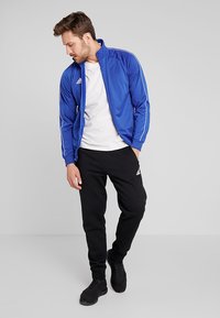 adidas Performance CORE ELEVEN FOOTBALL TRACKSUIT JACKET - Chaqueta de entrenamiento - blue/white