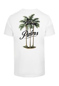 White cotton t-shirt featuring a graphic of three green palm trees with the text "Go Find Me Under the Palms" in black cursive below.