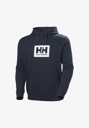 Sudadera con capucha Helly Hansen en azul marino, con bolsillo frontal tipo canguro, capucha con cordón y parche cuadrado con el logo blanco en el pecho.