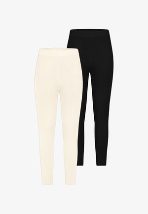 Zwei Paar gerippte Leggings: eines in Elfenbein und eines in Schwarz. Beide zeichnen sich durch ein eng anliegendes Design und einen elastischen Bund aus und zeigen eine glatte Textur.