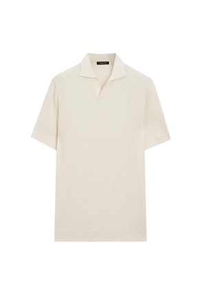 Cremefarvet polo T-shirt med korte ærmer, ribbet tekstur og åben krave, vist på hvid baggrund.