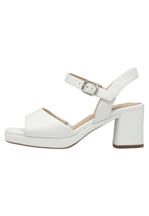 Fehér bőr szandál blokk sarokkal, nyitott orral, bokapánt ezüst csattal és párnázott talpbéléssel.