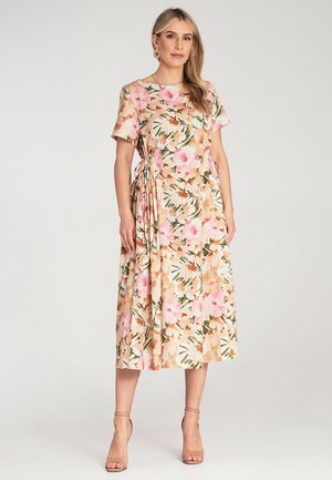 Blumen-Midi-Kleid in sanften Rosa- und Pfirsichtönen, mit kurzen Ärmeln, lockerer Passform und seitlichen Bändern zur verstellbaren Raffung.