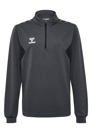 Zwarte sportpullover met een hoge kraag, kwartlange rits, gestructureerde stof en contrasterende zwarte zijpanelen. Beschikt over een logo op de borst.