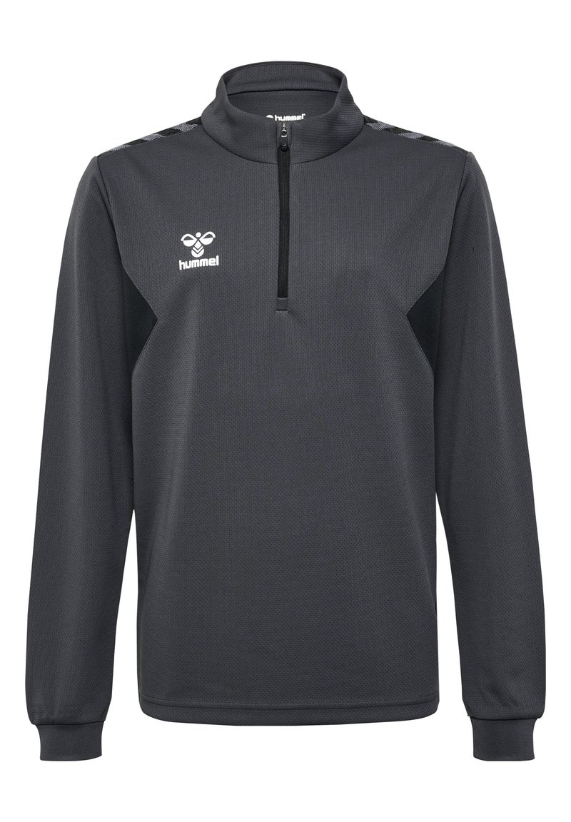 Zwarte sportpullover met een hoge kraag, kwartlange rits, gestructureerde stof en contrasterende zwarte zijpanelen. Beschikt over een logo op de borst.