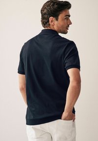Next TEXTURED - Polotričko - black vertical