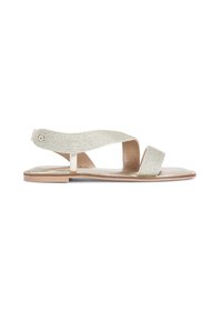 Sandali piatti con una tomaia intrecciata in oro metallico. Presentano una fascetta per le dita e una fascetta ankle regolabile. Suola liscia beige. Design minimalista.